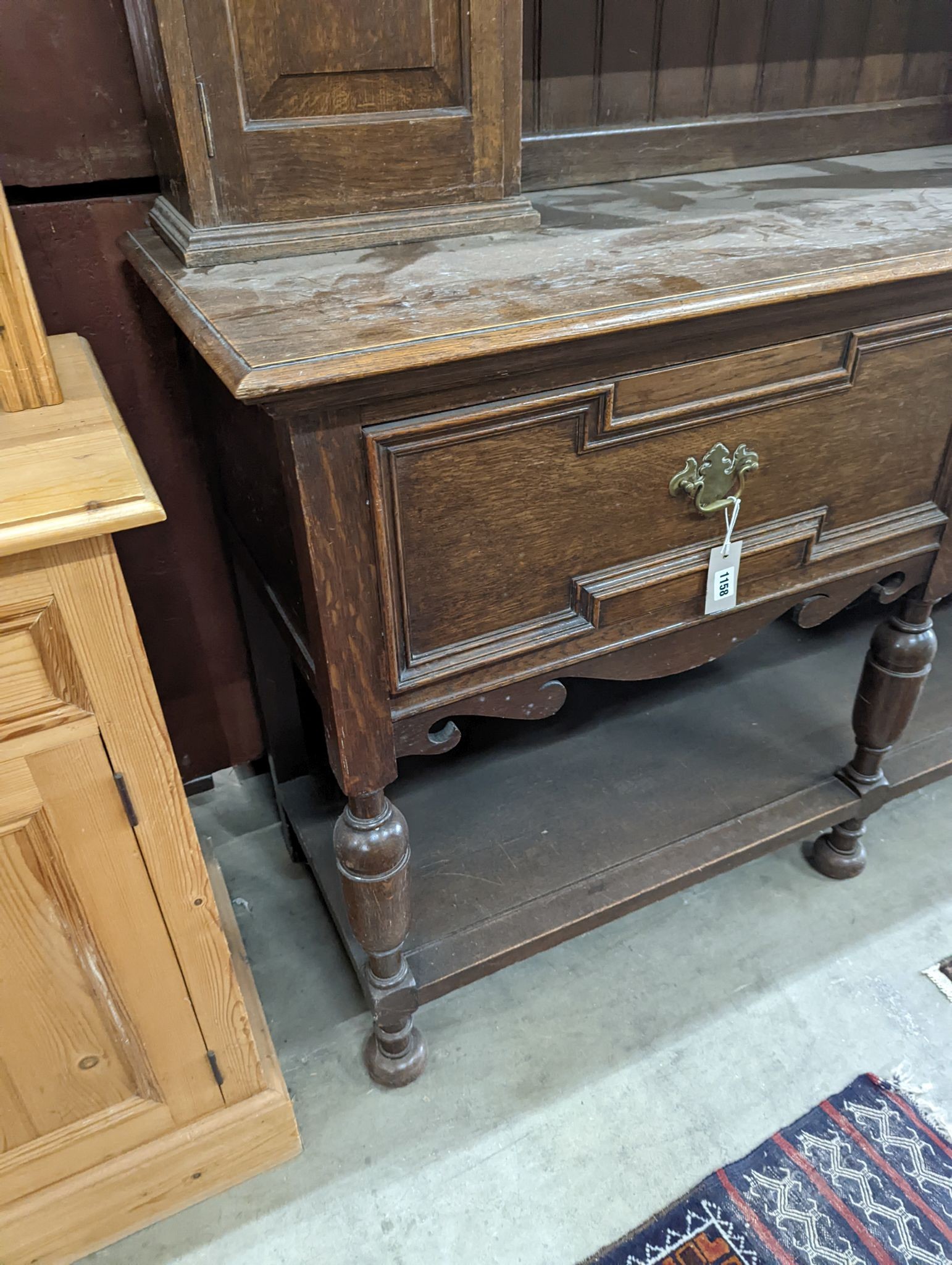 A 1920's oak dresser, length 152cm, depth 49cm, height 188cm